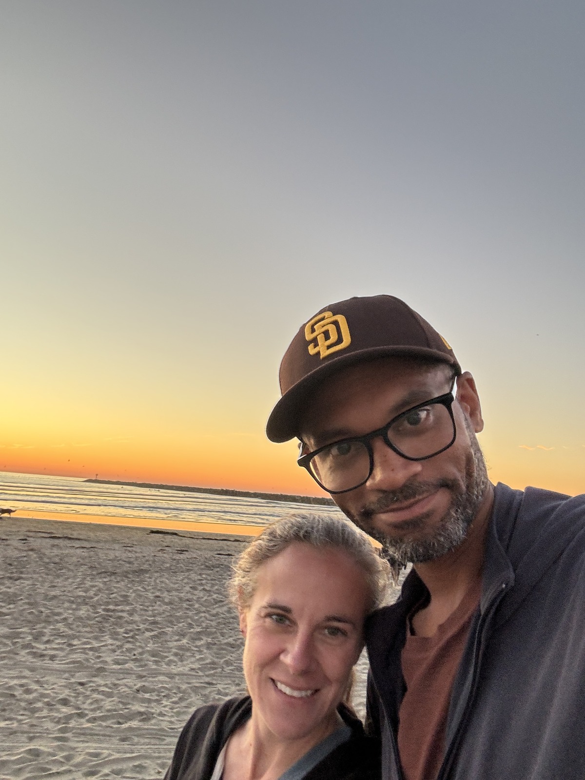 Backlit sunset faces